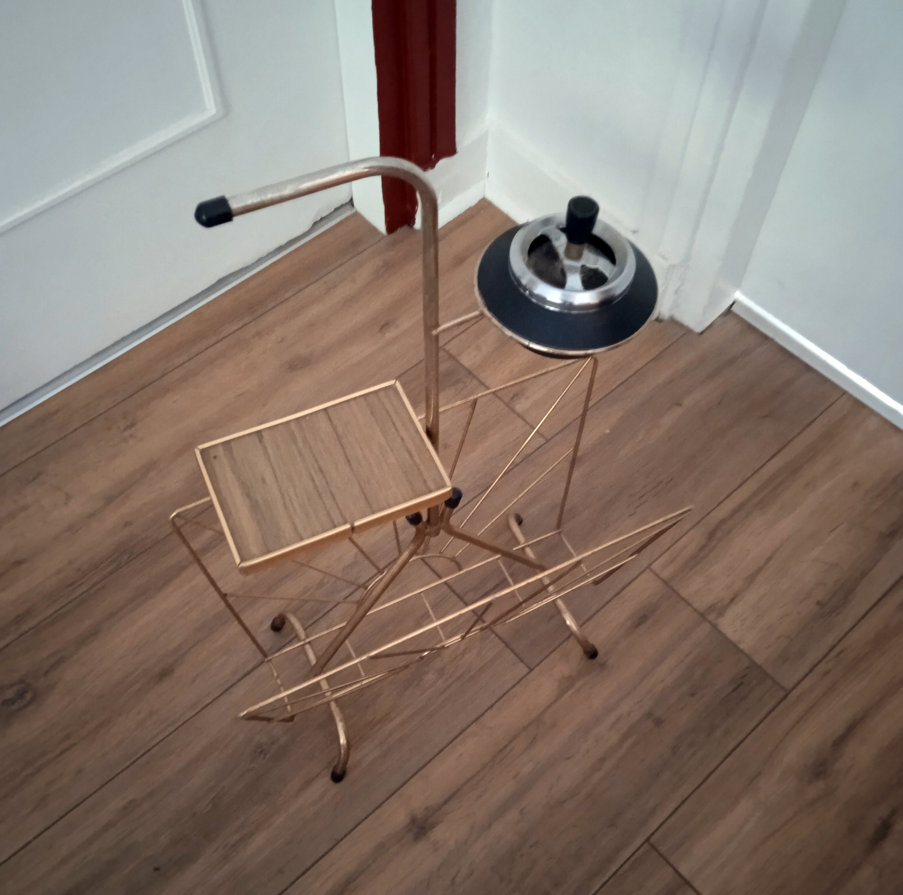 Modernist brass magazine holders