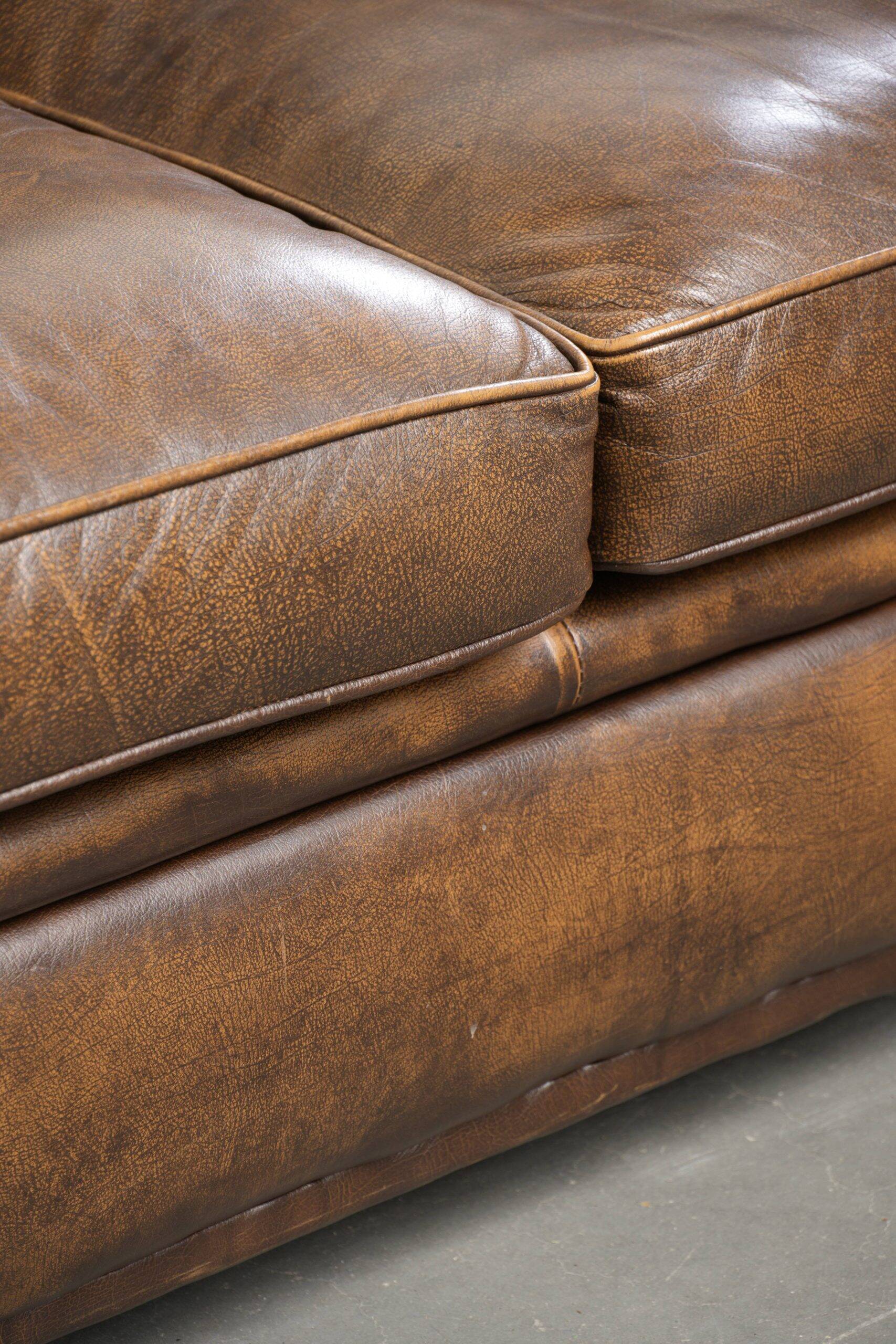 English cowhide leather Chesterfield 2-seater sofa in a luxurious colour