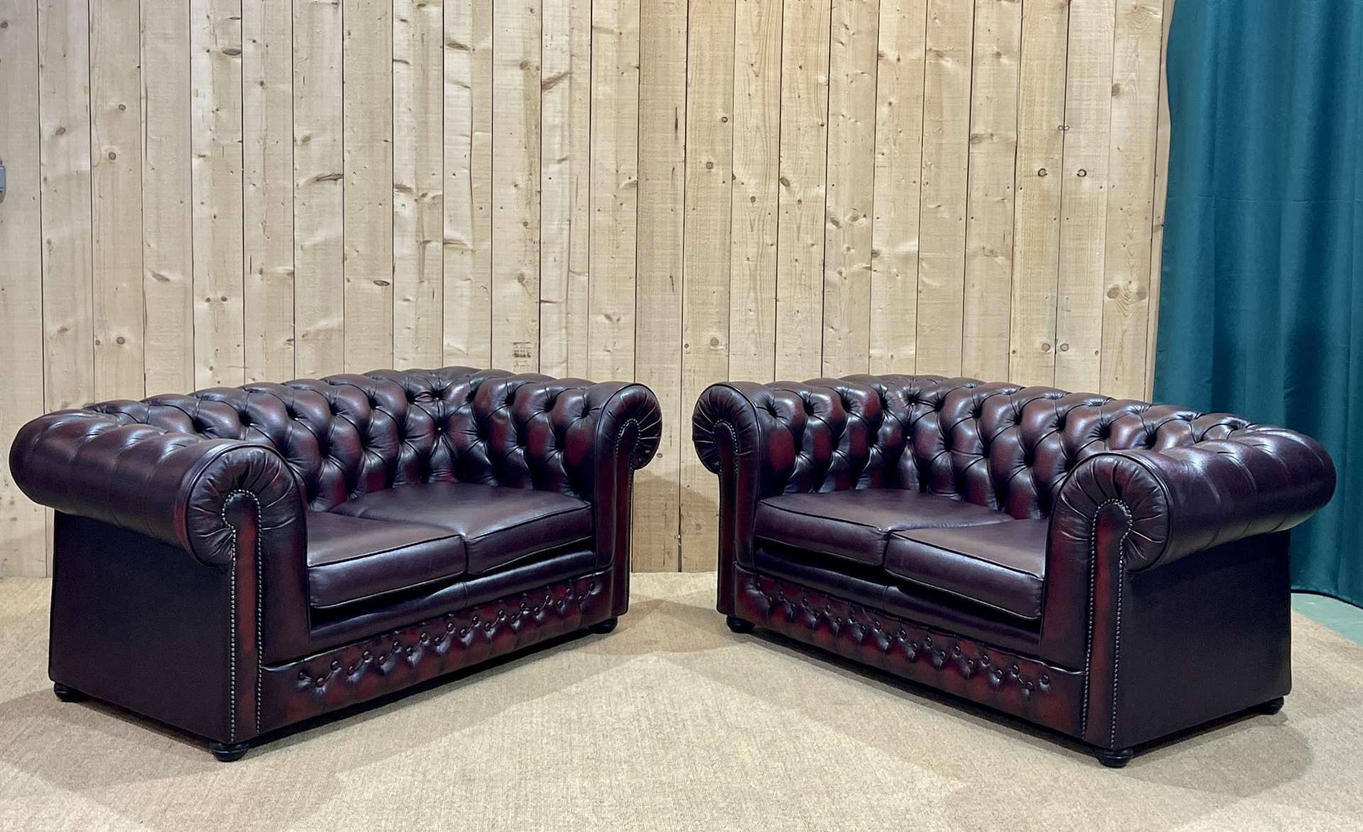 Pair of 2-seater leather Chesterfield sofas from the 1990s by Thomas LLOYD