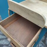 Asymmetrical changing table cabinet