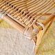 Fauteuil ancien en rotin large dossier