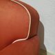 Red satin club armchair