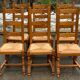 6 dining chairs made of solid medium oak with straw seats, 110cm