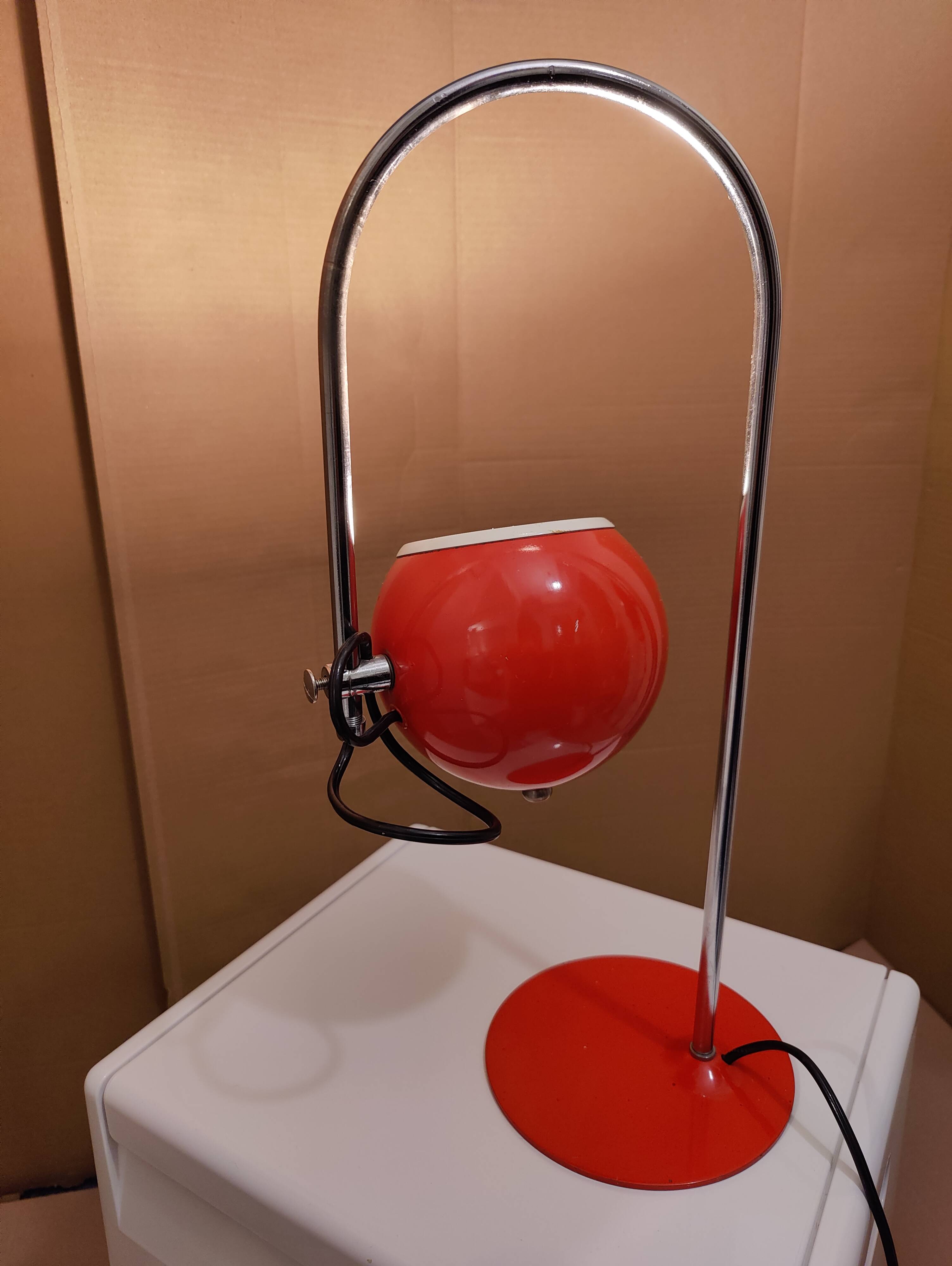 Eyeball space age orange desk or bedside lamp on an arc base
