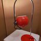 Eyeball space age orange desk or bedside lamp on an arc base