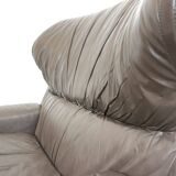 Saporiti Vela Alta leather armchair with ottoman by Giovanni Offredi