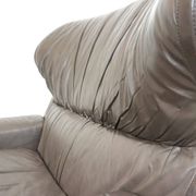 Saporiti Vela Alta leather armchair with ottoman by Giovanni Offredi