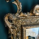 Miroir doré en bois