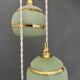 Suspension triple vintage glass globes in frosted green and gold.