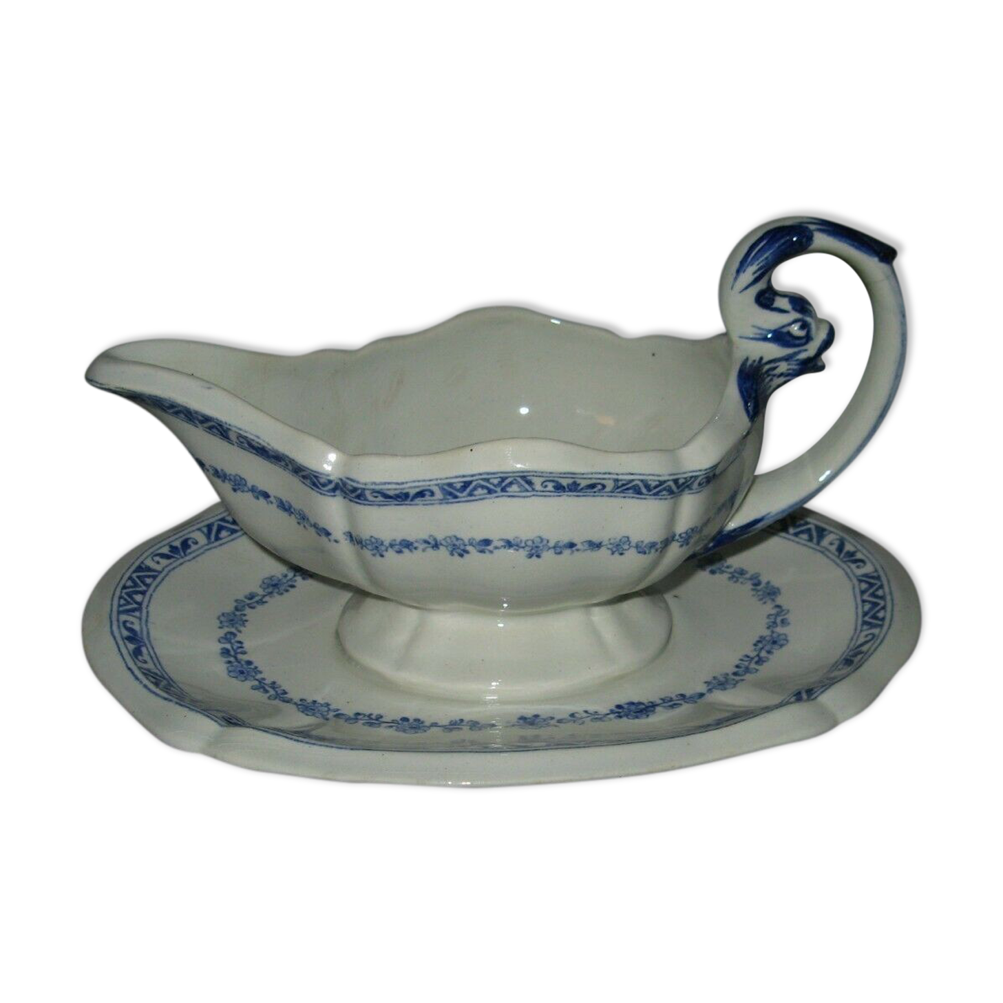 Saucière in Gien earthenware anse in the shape of a dolphin decoration garland 1900