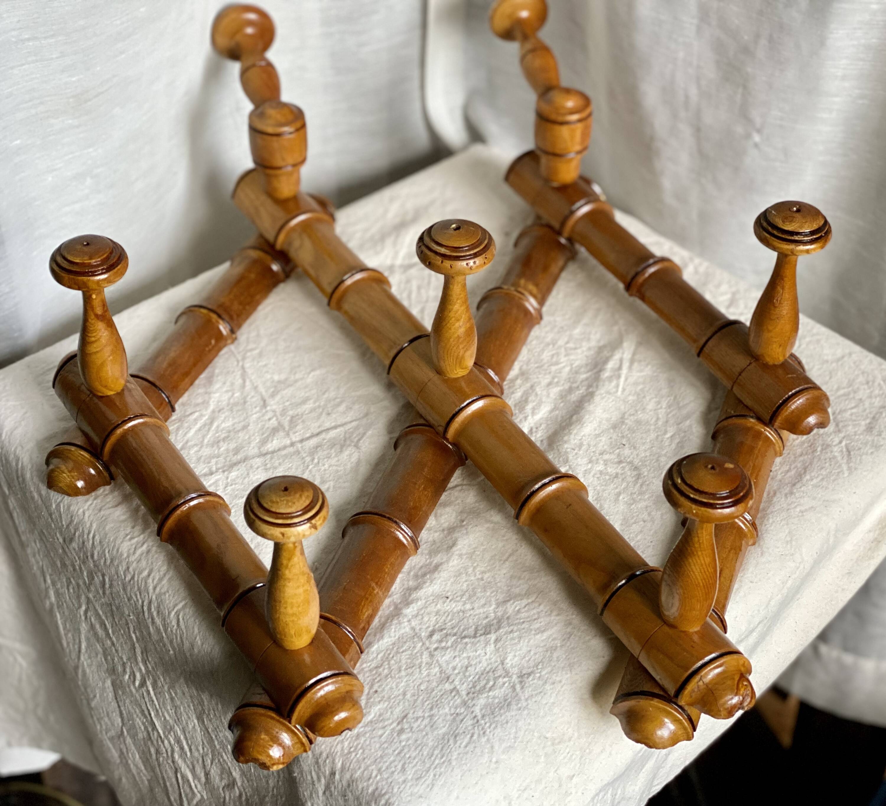 19th century turned wood accordion coat rack.