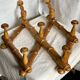 19th century turned wood accordion coat rack.