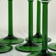 8 Alsatian stemmed glasses, transparent glass and green stems.