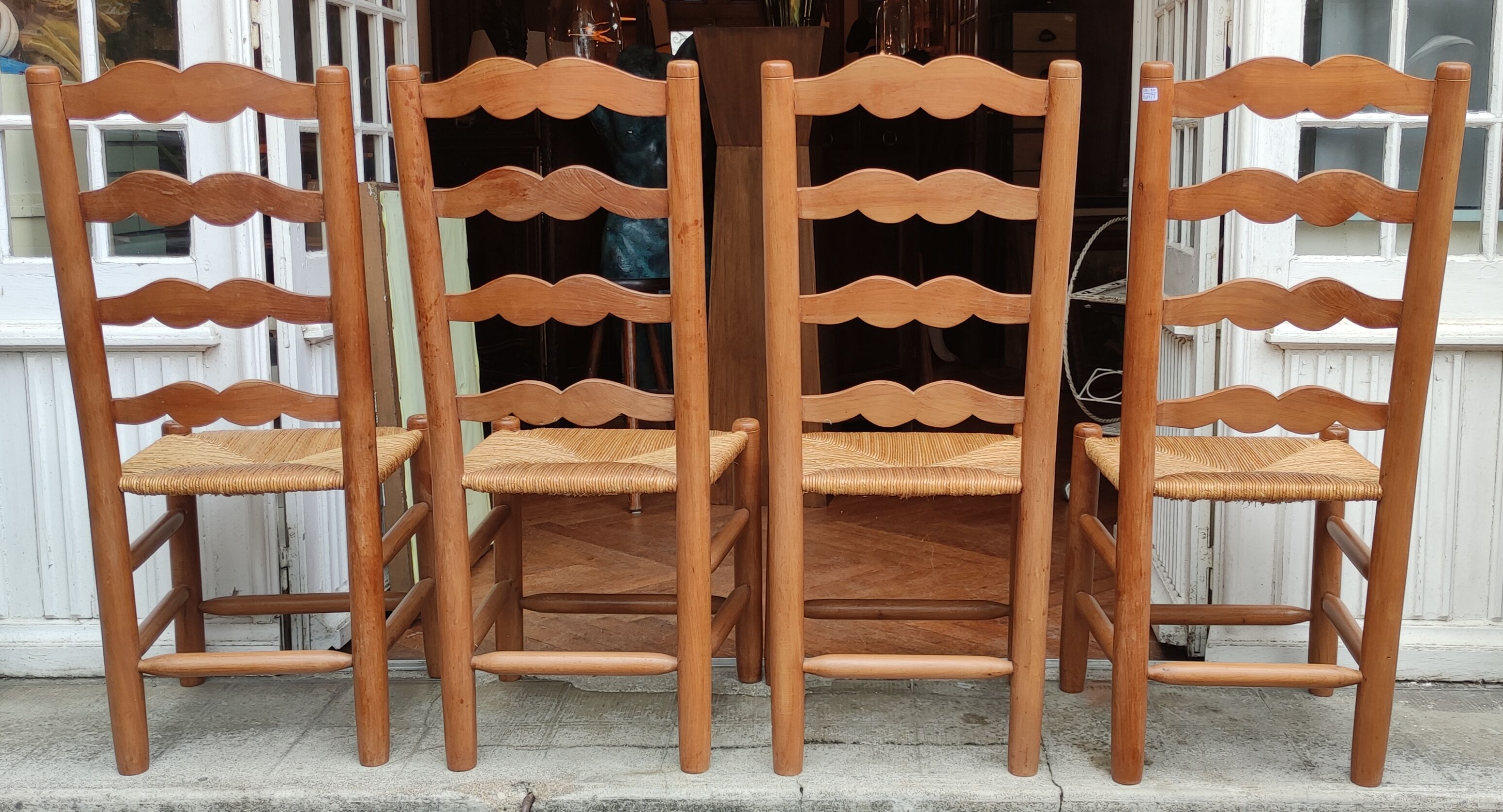 Series of 4 antique mulched chairs