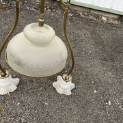 Antique brass chandelier with 3 lights and frosted glass shades.
