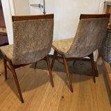 (Lot) 2 teak designer chairs (1950s)