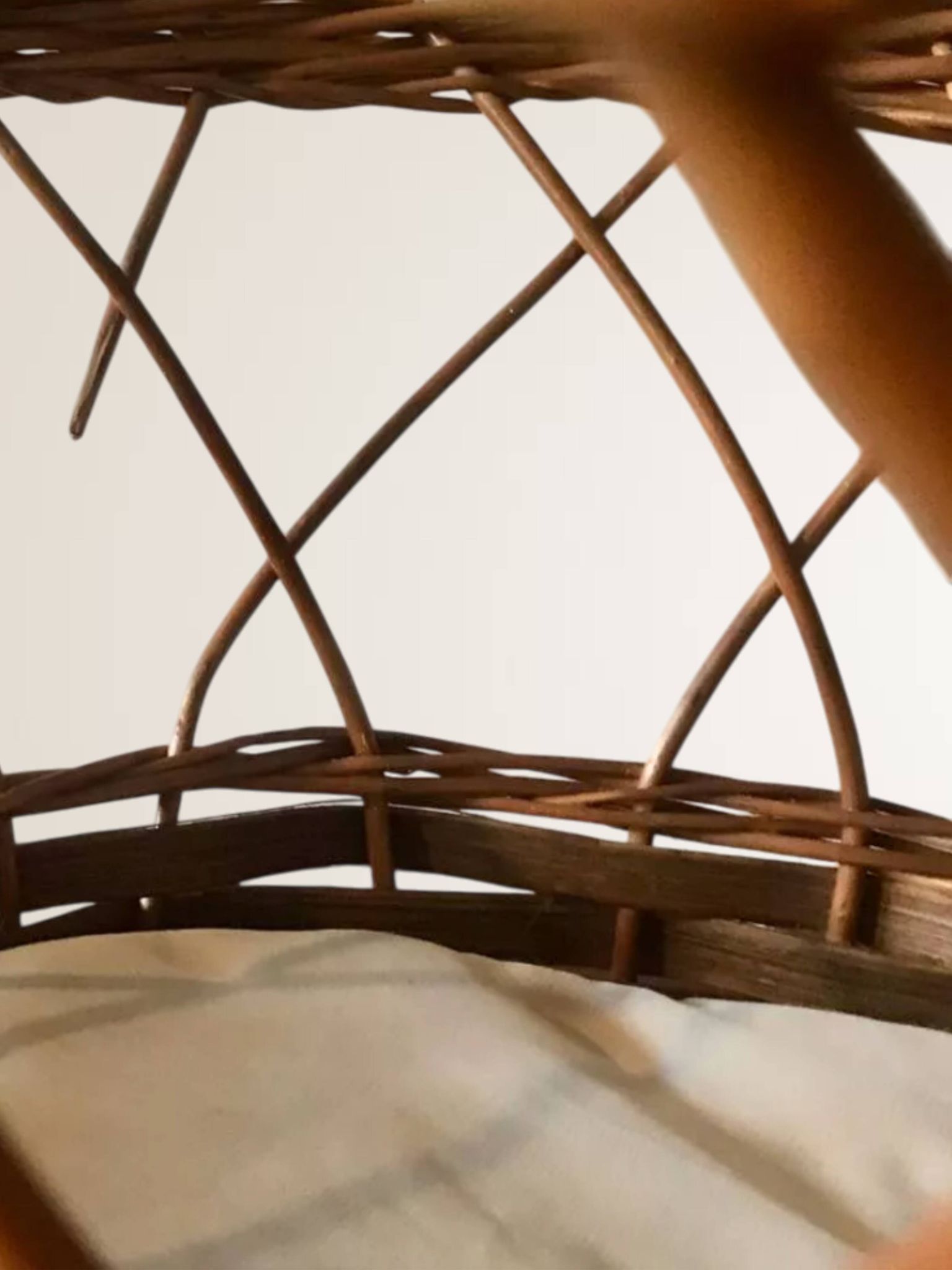 Woven wicker bassinet