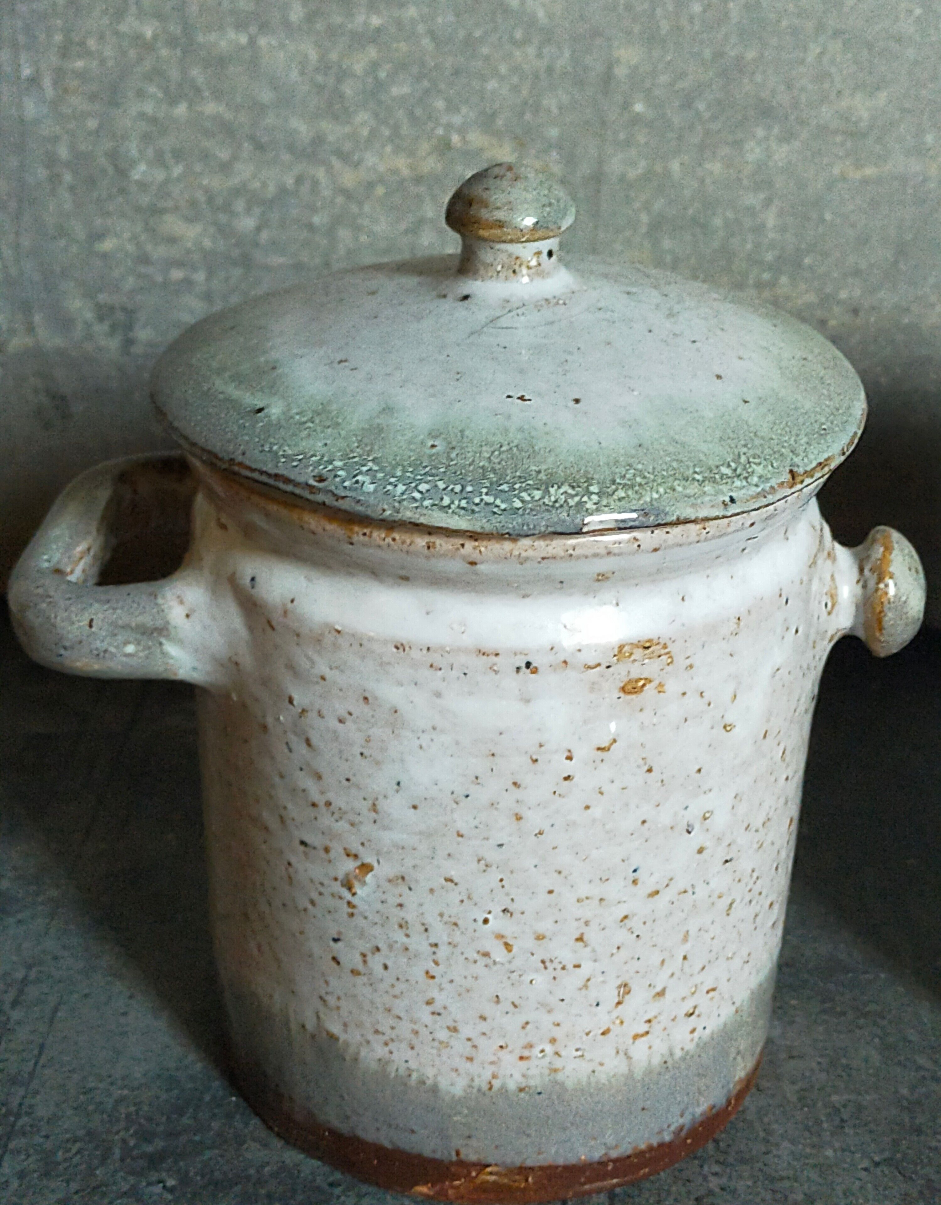 Duo of potter's pots covered in vintage glazed stoneware