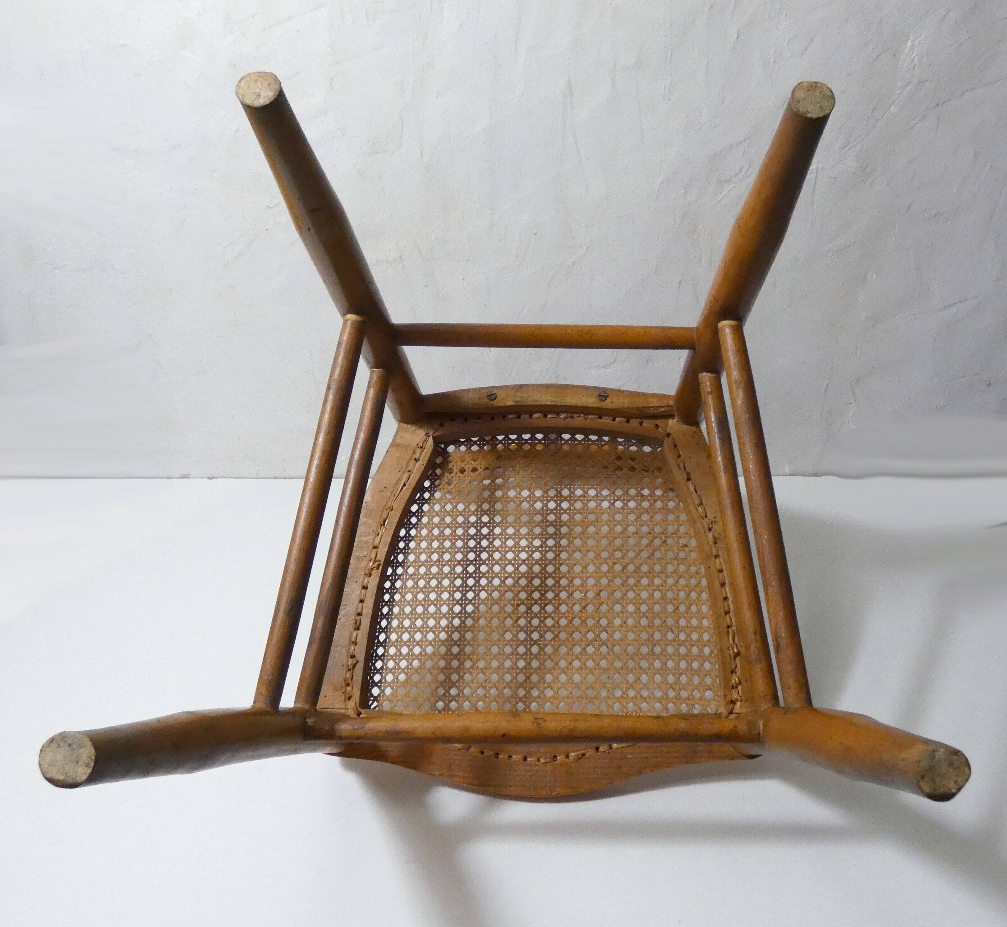 vintage wooden bistro chair with caning