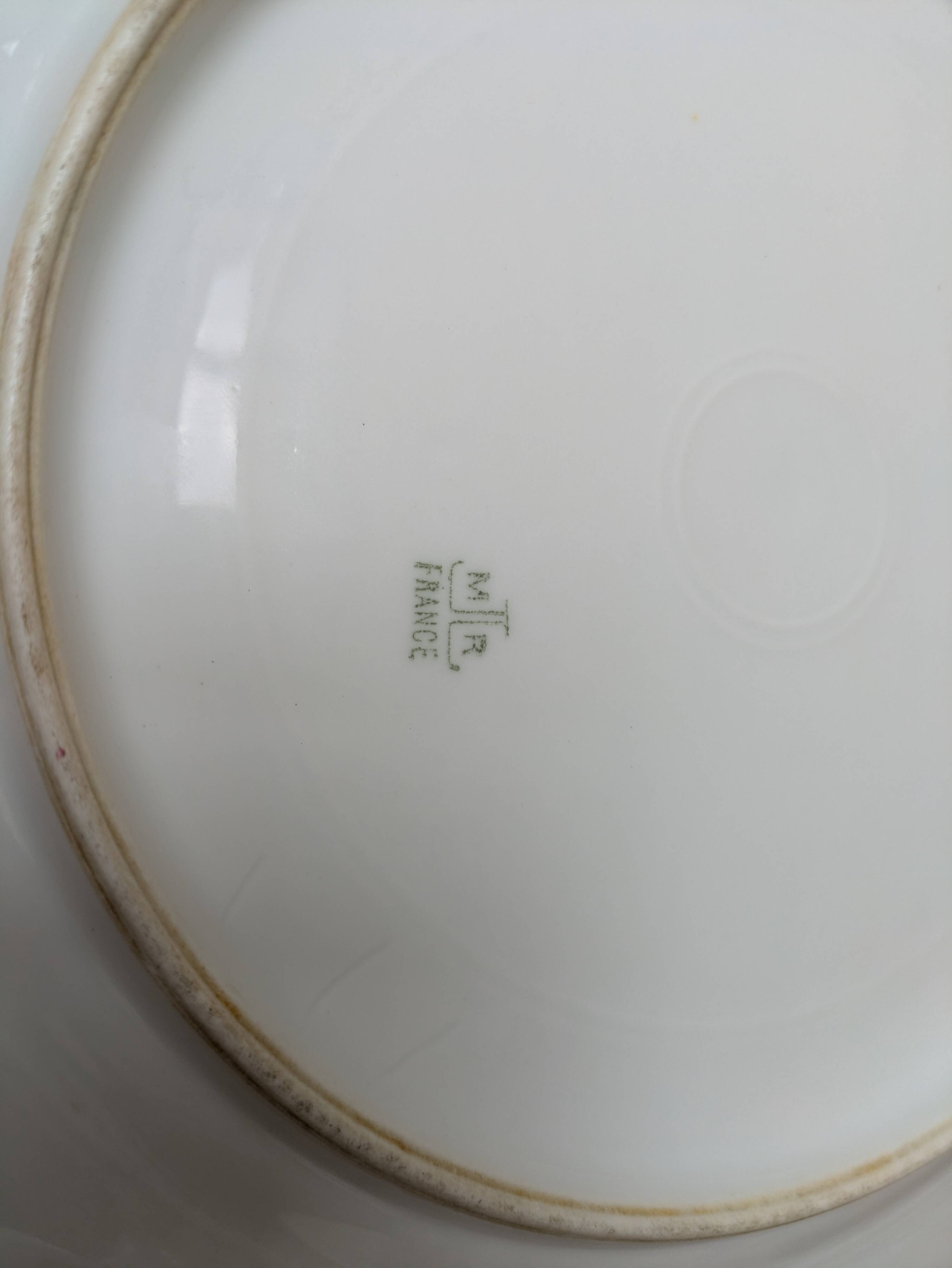 Porcelain plate with floral decoration, gilding, and relief MR France 25.5cm
