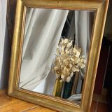 Antique mirror in gilded wood