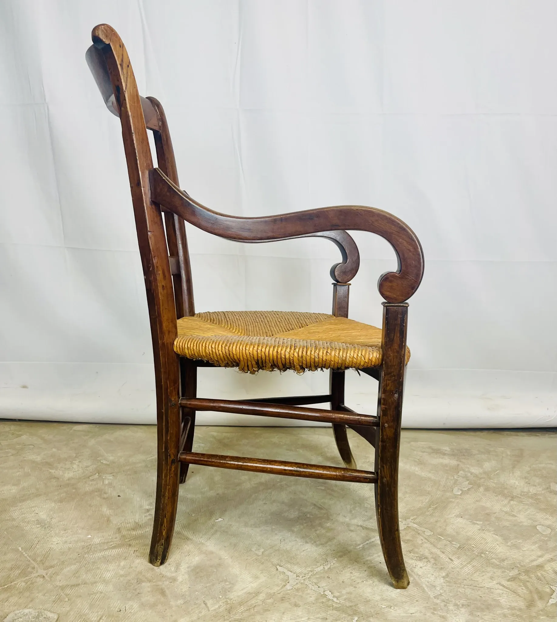 Pair of dissimilar walnut armchairs
