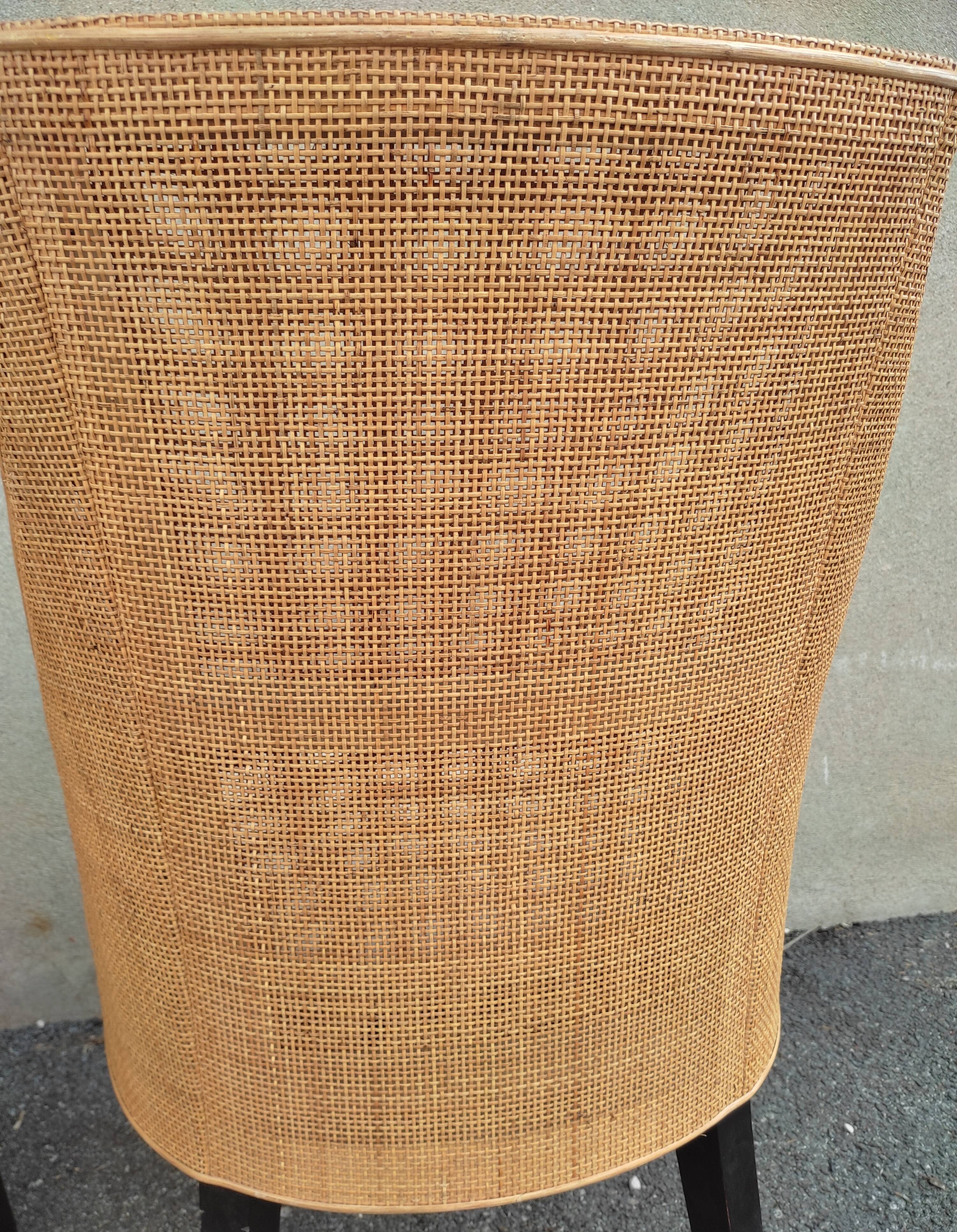 Canine rattan armchair