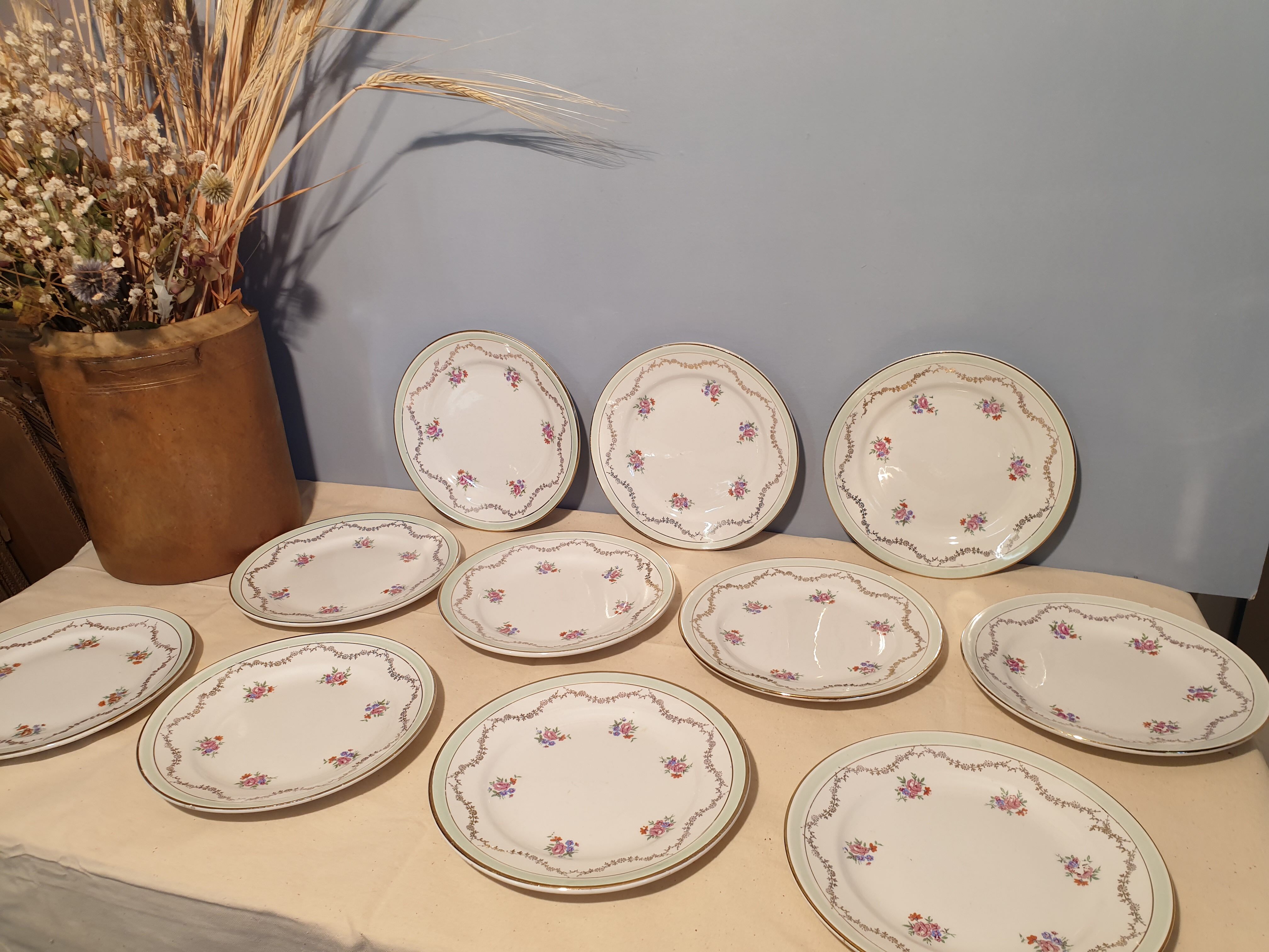 Suite of 11 St Amandinoise dessert plates