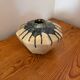 Scandinavian studio vase in flamed stoneware with drip decorations.