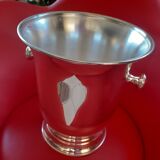 Champagne bucket in silver metal.