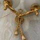 Gold wall light