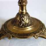 Pair of cherub candle holders in gilded bronze, early 20th century.