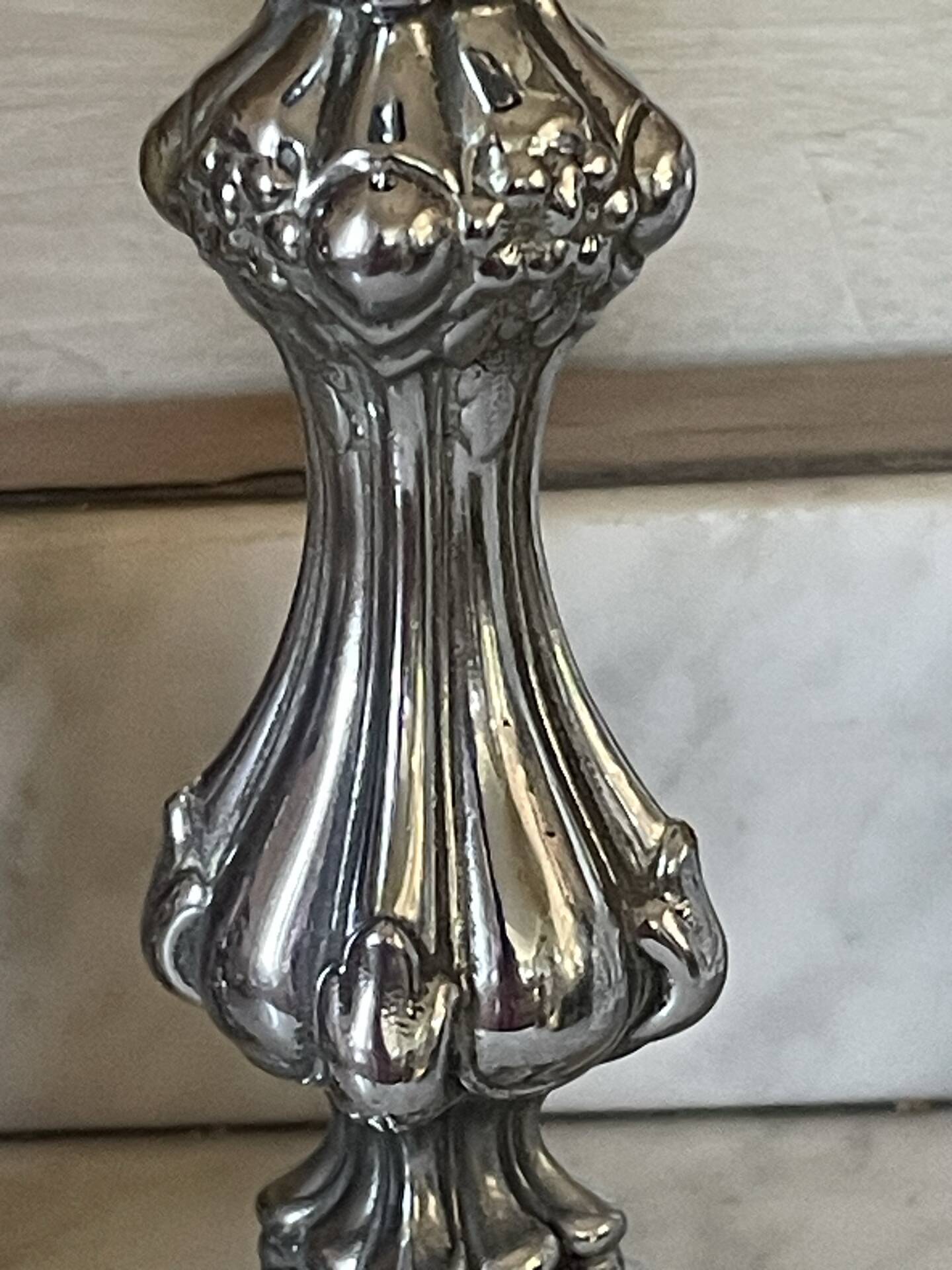 Pair of rococo silver-plated candlesticks