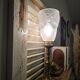Lampe à poser pied bougeoir en laiton et tulipe Degué signée