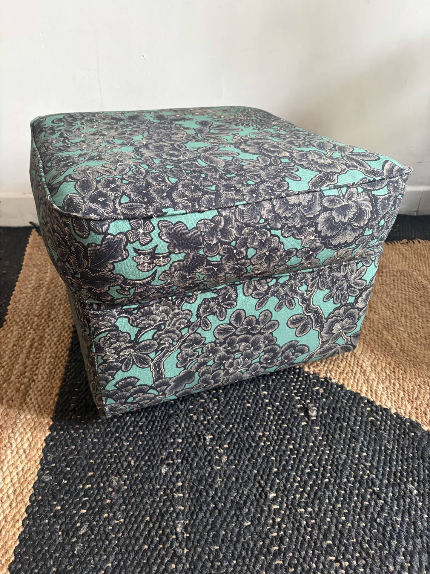 Upholstered pouffe