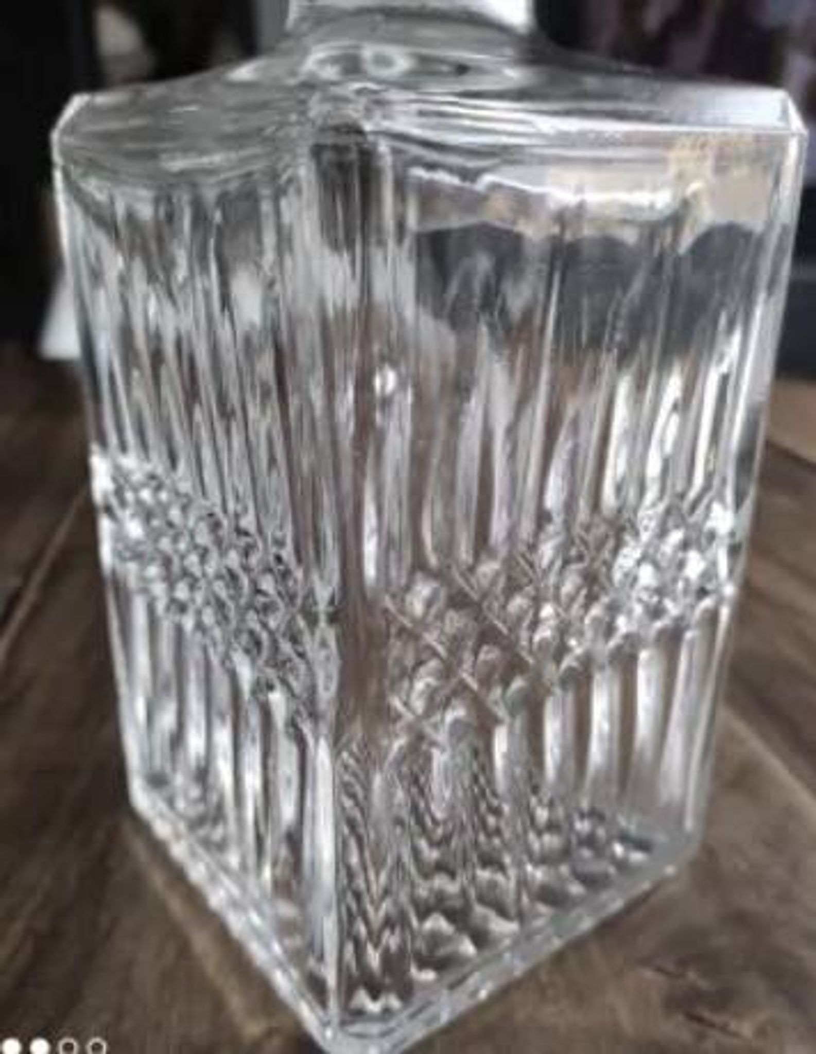 Vintage whiskey decanter in diamond faceted glass airtight stopper