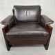 Vintage Leolux brown leather/oak lounge chair and ottoman by Harry de Groot – 1970