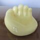 Empty hand-shaped pocket in pale yellow ceramic years70