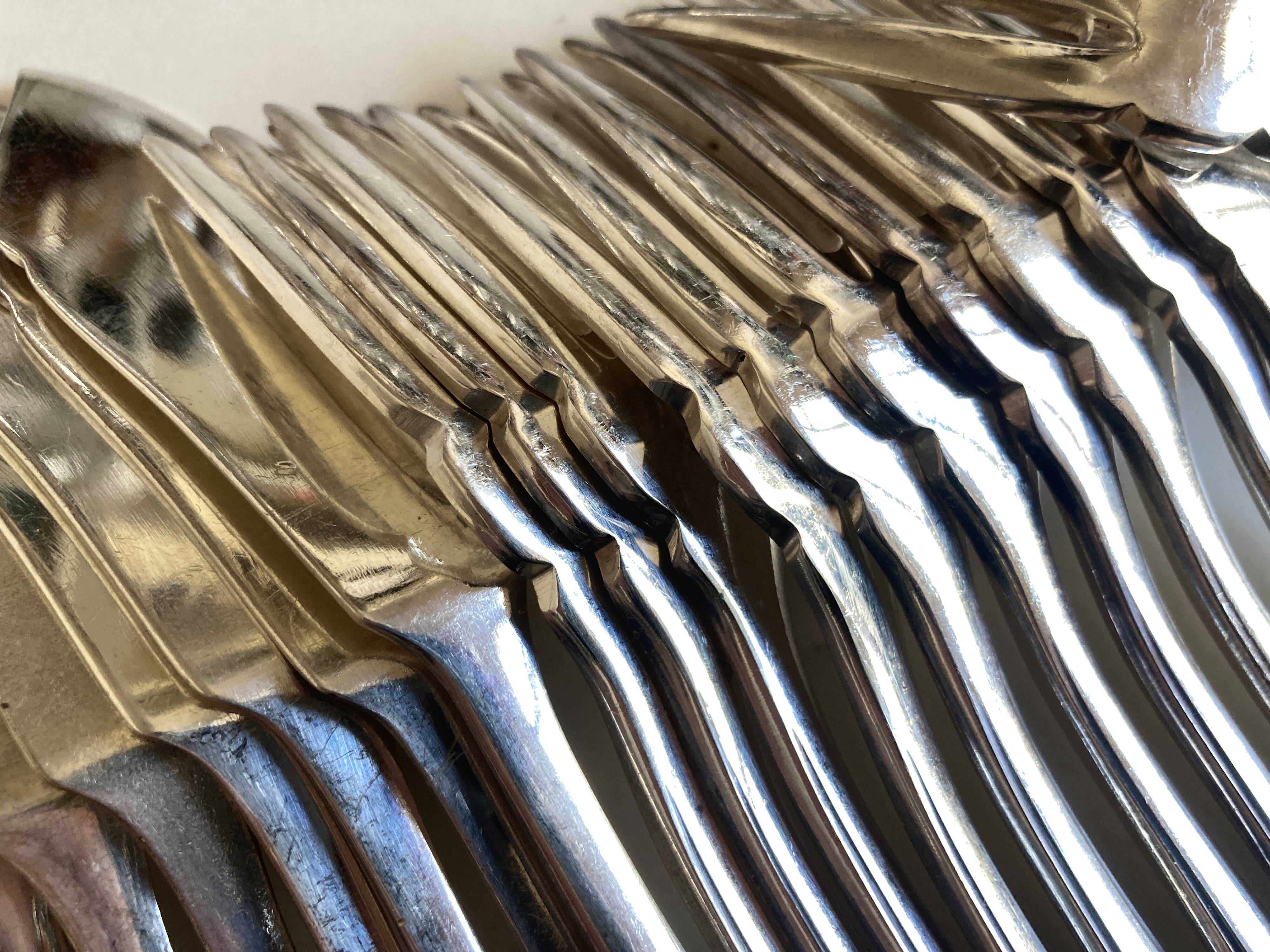 Set of 12 knives and 12 forks of brasserie La Coupole 1970