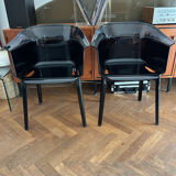 "Papyrus" black armchairs designed by Ronan and Erwan Bouroullec.
