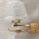 Double wall light in gold-tone metal and bubbled glass, Italian design from the 1960s