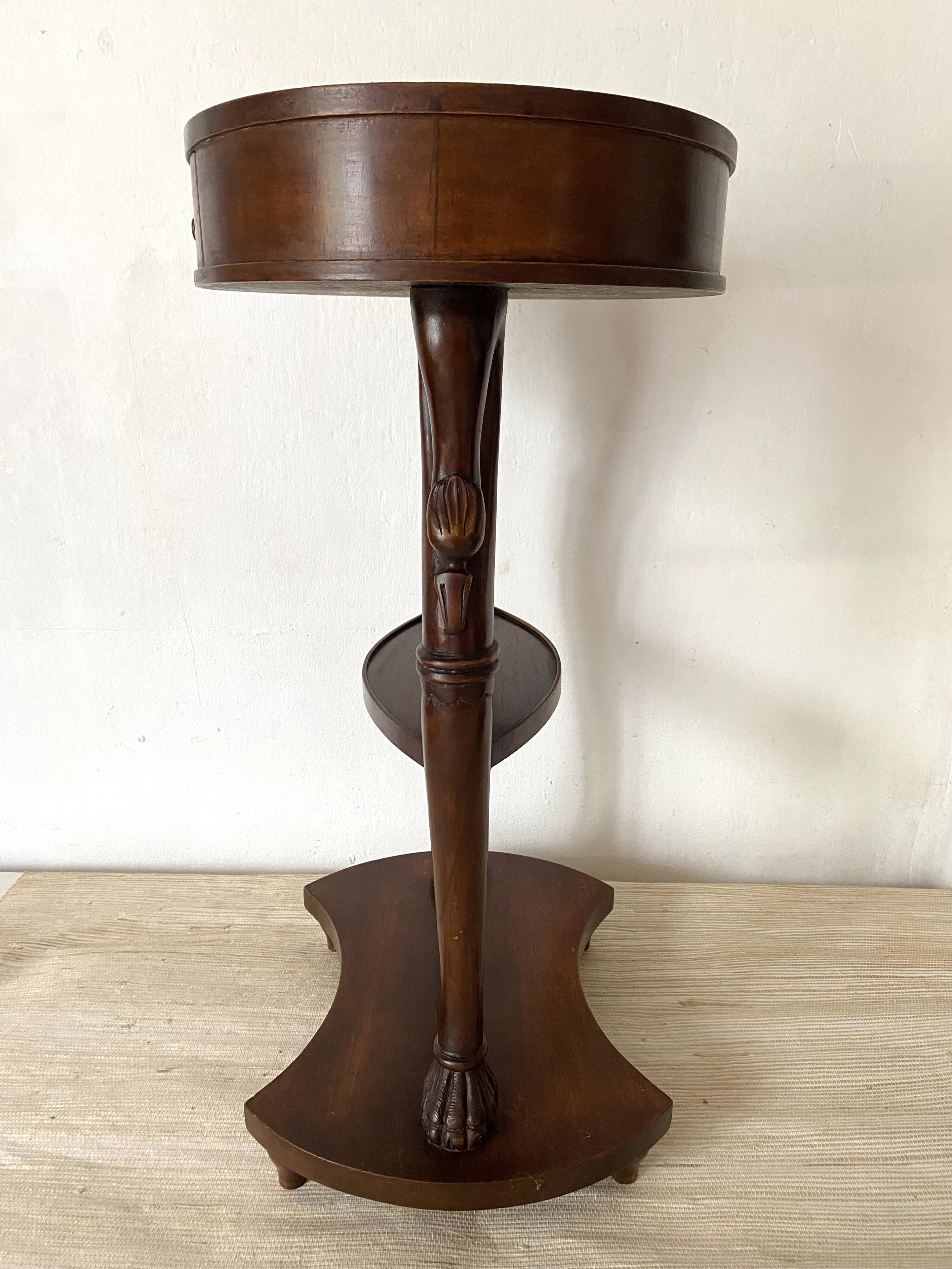 Empire style swan neck and lion paw pedestal table