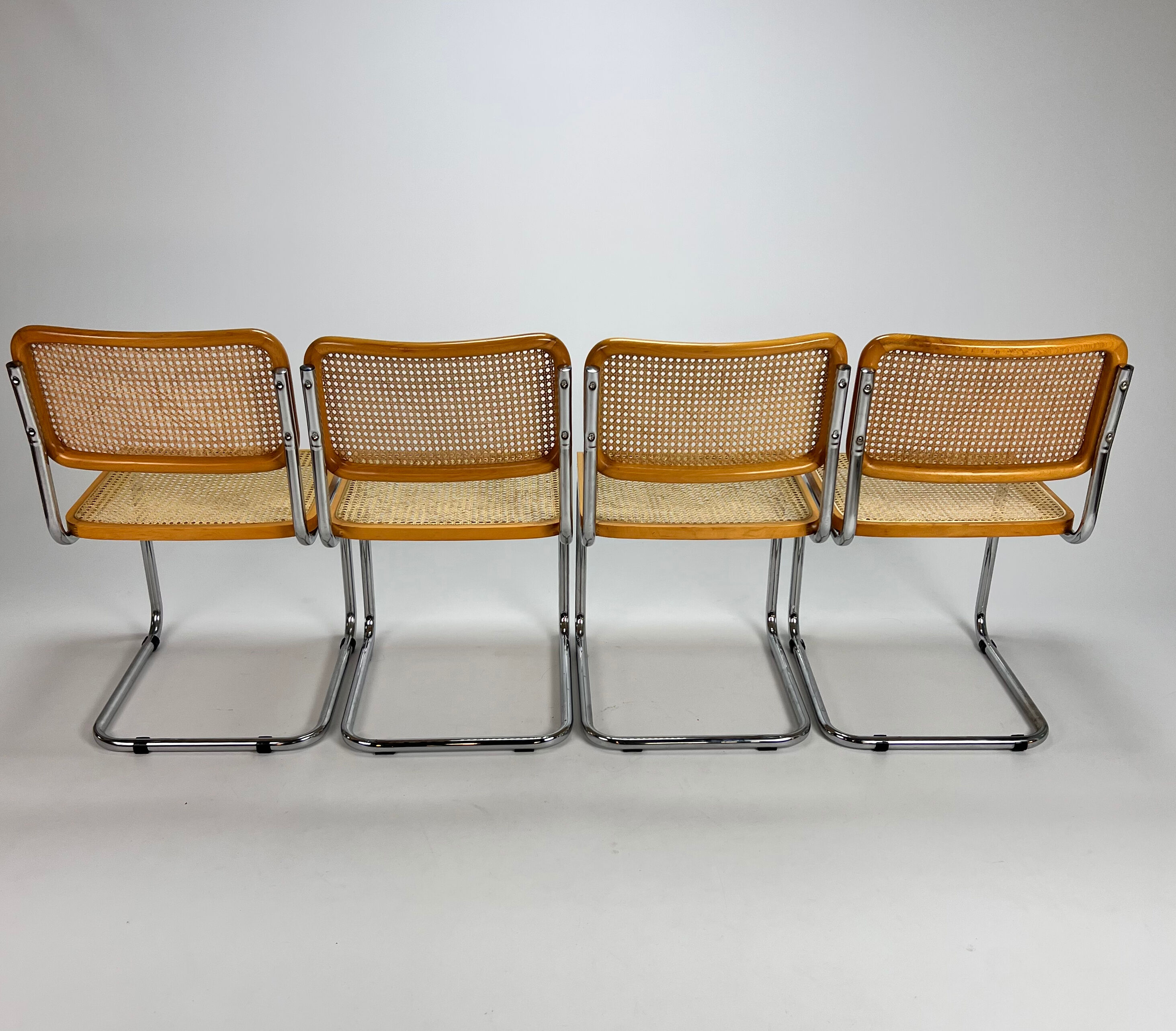 Set of 4 tubular frame and cane cantilever dining chairs, italy, 1970s