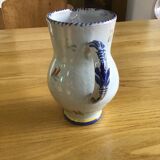 Earthenware pitcher with blue decor