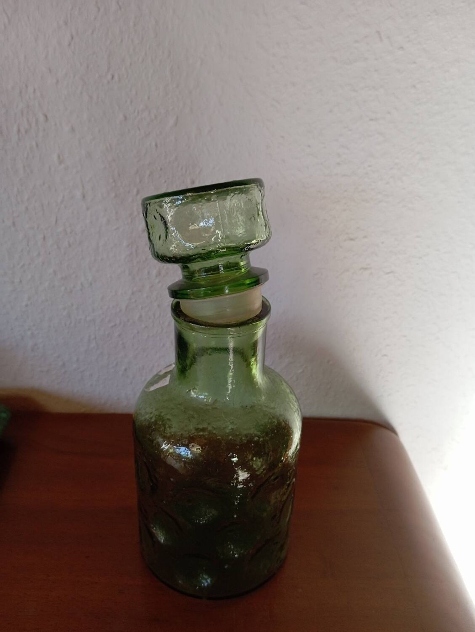 Round relief carafe from the 70s