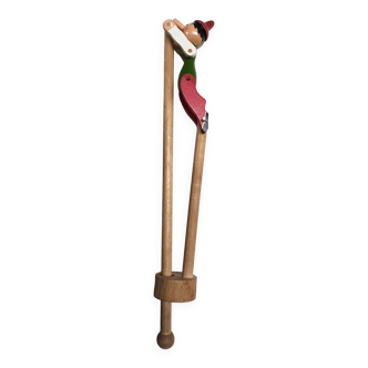 Wooden puppet Pinocchio acrobat