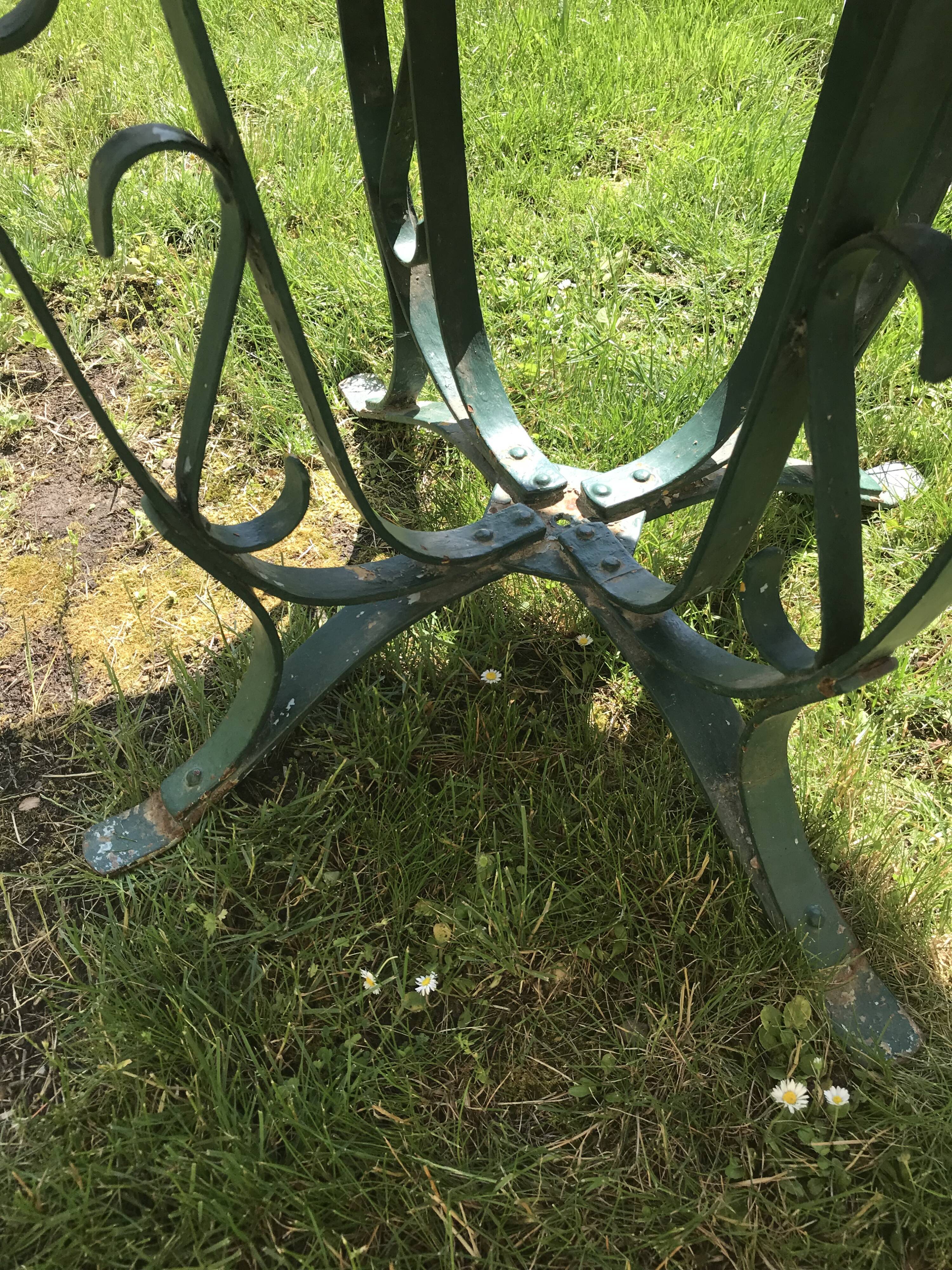 large antique iron table riveted