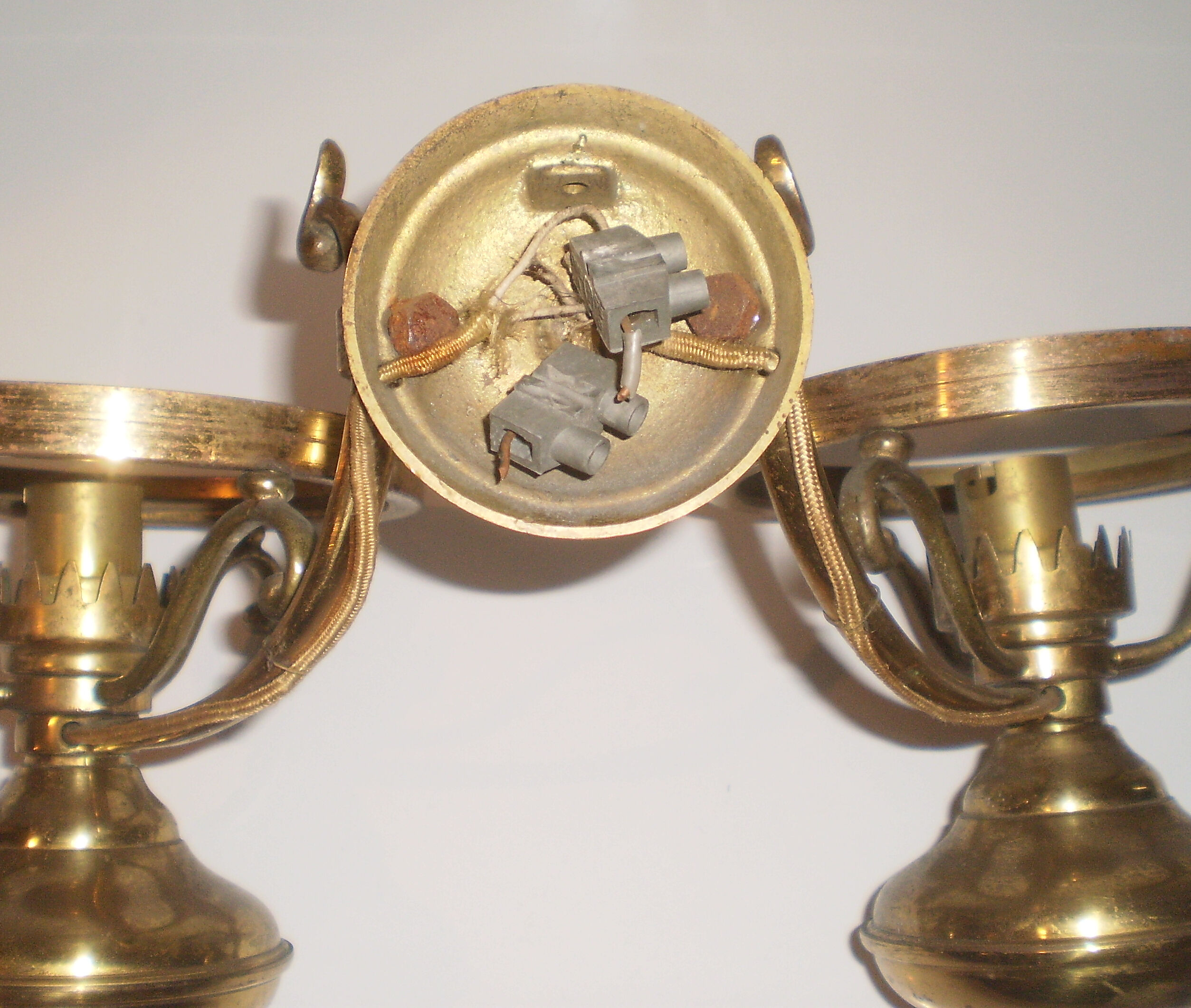 Glass brass globe sconce