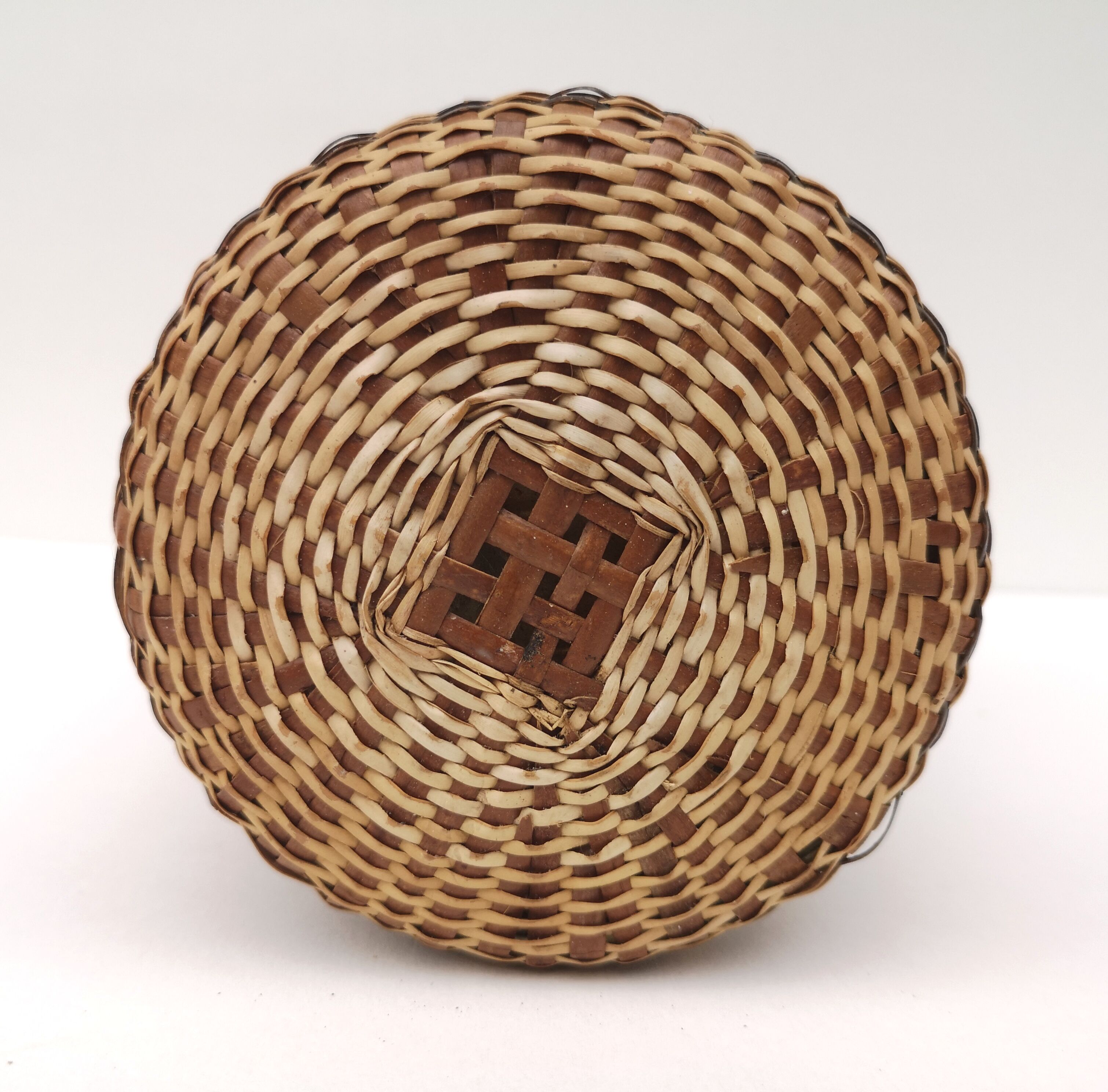 Vintage bottle in braided straw