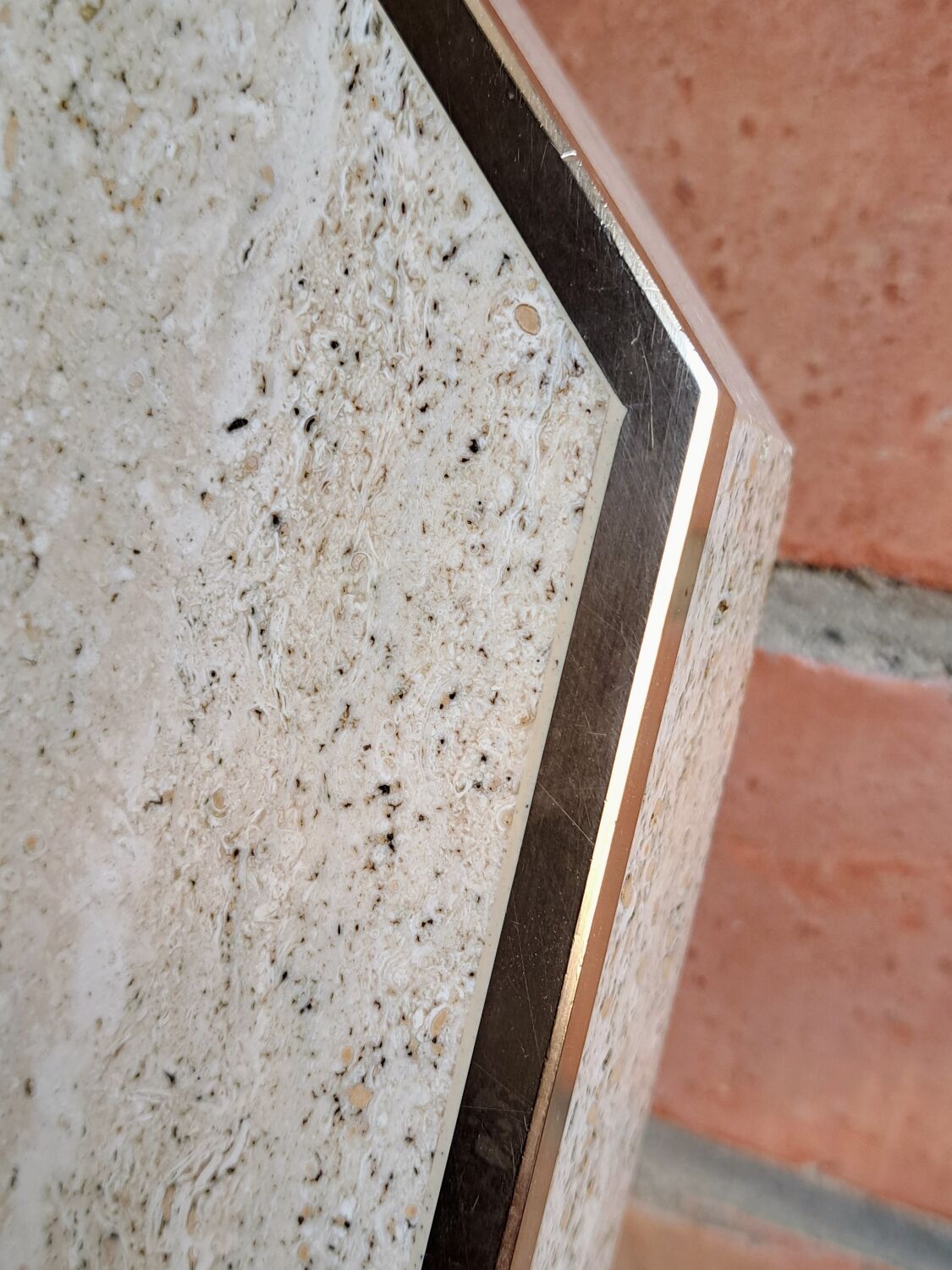 Travertine and brass coffee table